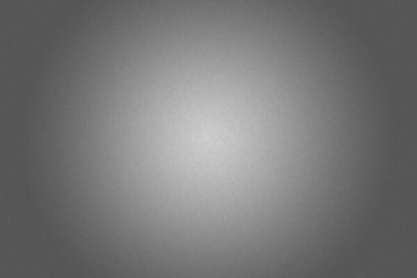 Minimaler grauer Hintergrund mit Erleuchtung in der Mitte