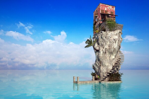 Haus auf einem Felsen mitten im Meer