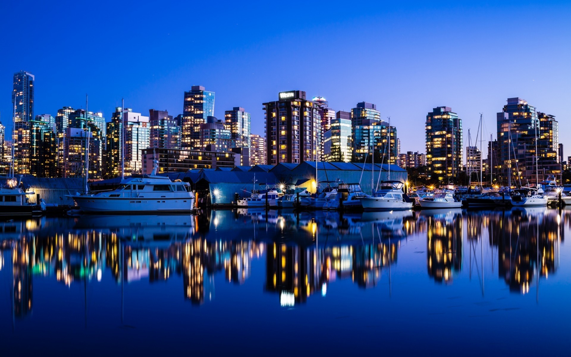andere städte reflexion stadt wasser dämmerung reisen architektur himmel abend stadt sonnenuntergang haus hafen promenade modern skyline urban pier business innenstadt nacht landschaft boot licht