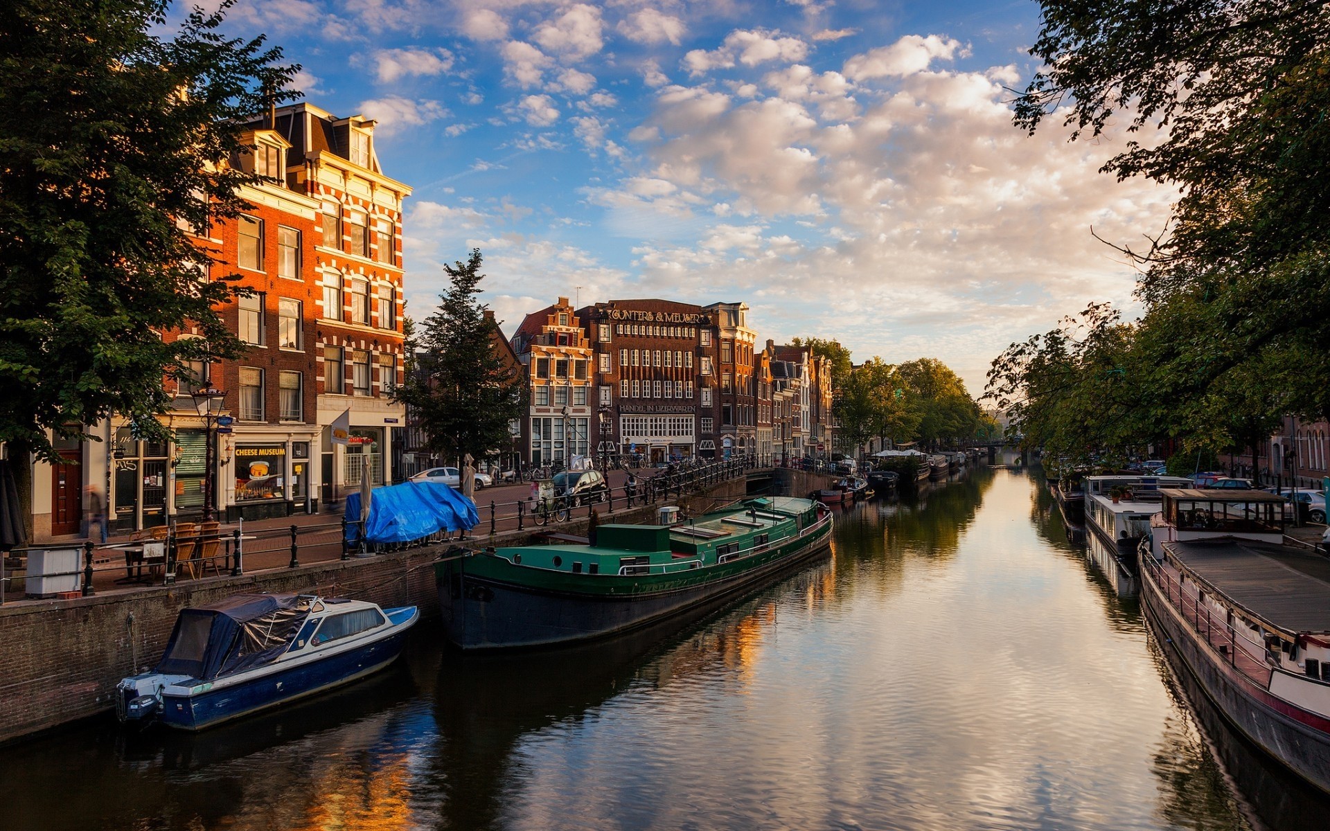 andere städte wasser kanal fluss boot reisen reflexion stadt wasserfahrzeug im freien architektur brücke himmel transportsystem amsterdam