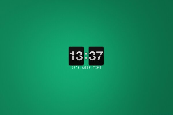 Elektronische Uhr auf grünem Hintergrund