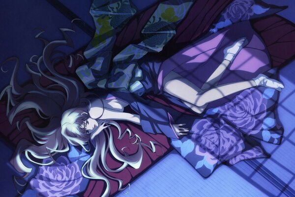 Mädchen liegt im Anime-Stil auf dem Boden