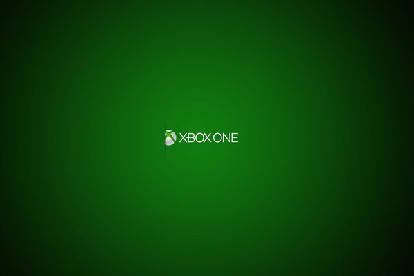 Das Logo der Xbox One Konsole im Spotlight auf grünem Hintergrund