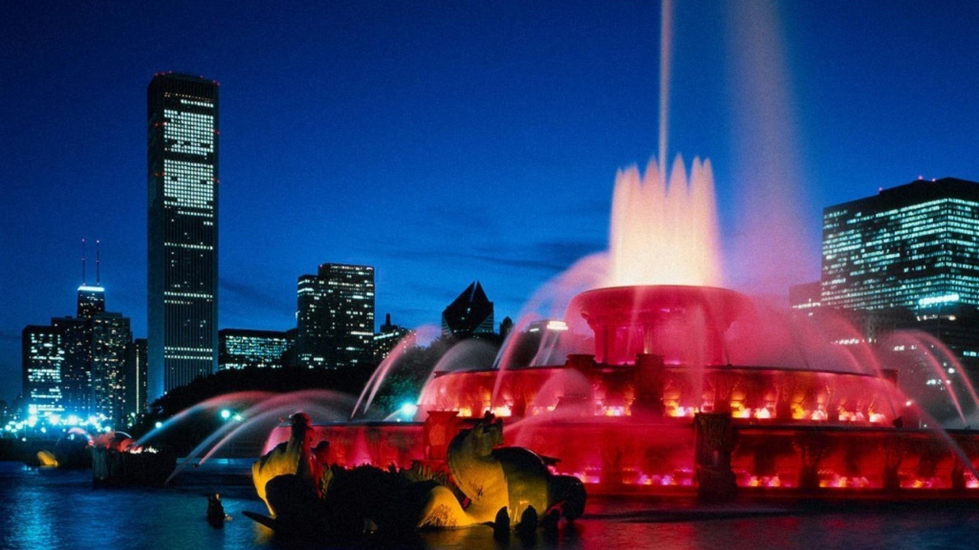 stadt stadtzentrum wolkenkratzer stadt abend dämmerung reisen skyline architektur haus urban licht straße sonnenuntergang brücke wasser reflexion hintergrundbeleuchtung fluss himmel