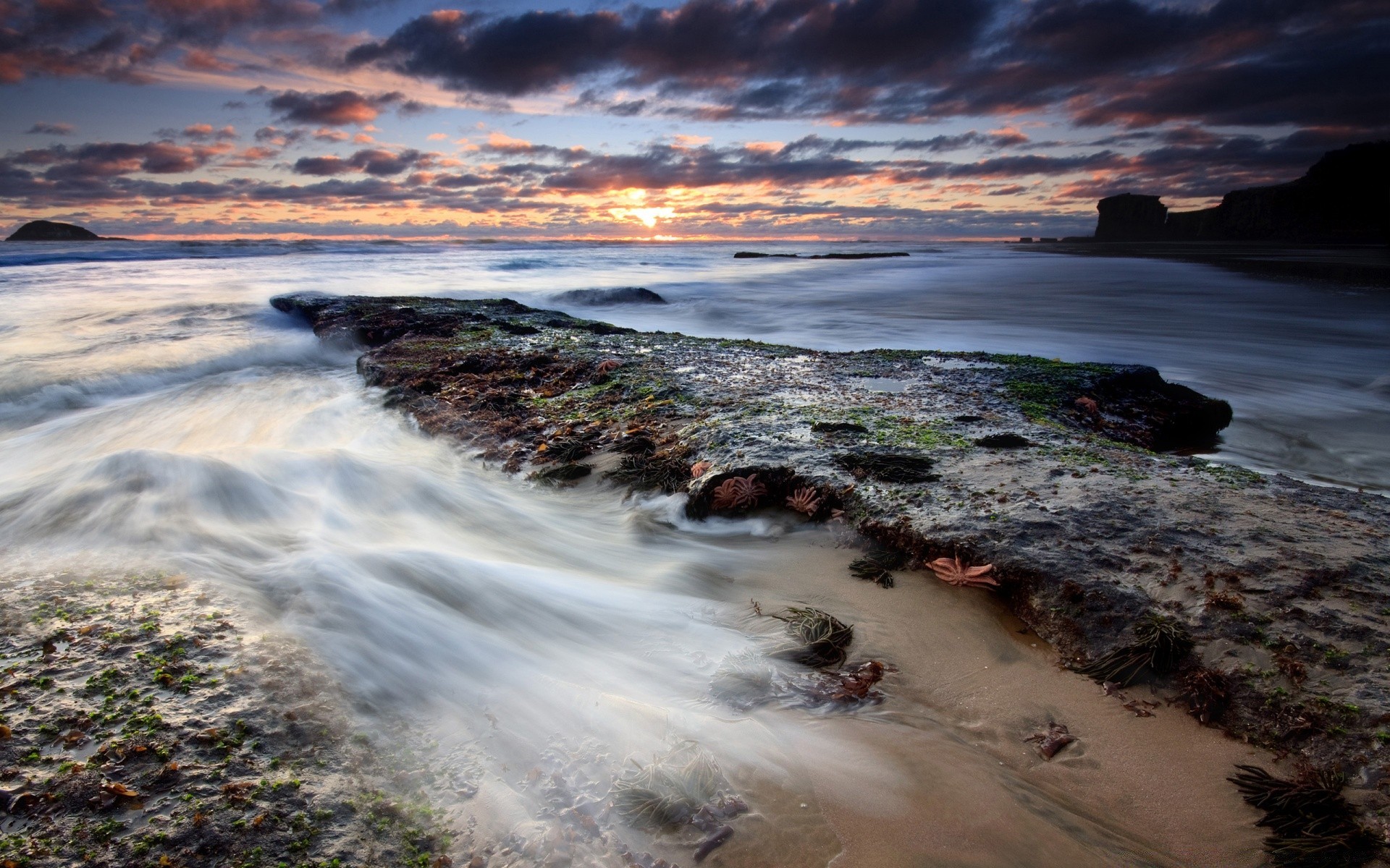 meer und ozean wasser sonnenuntergang landschaft strand meer ozean reisen natur dämmerung landschaft himmel meer abend dämmerung rock im freien